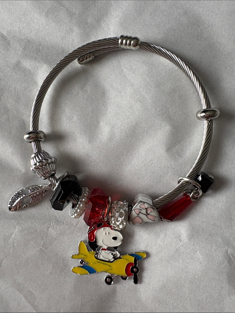 Silver-Tone Snoopy Airplane Charm Bracelet with Red and Black Accents